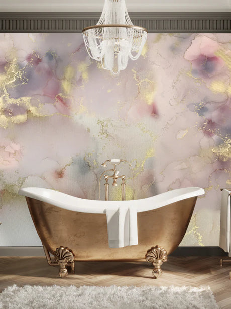 Turn your bathroom into the get-away space with this blush, grey and gold wallpaper decor. The soft blush tones and canvas textures bring all the vibes of California decor into your home. This bathroom interior installation used a gold clawfoot bathtub, herringbone wood floors and brass towel racks to create a minimal, classic yet modern feel.