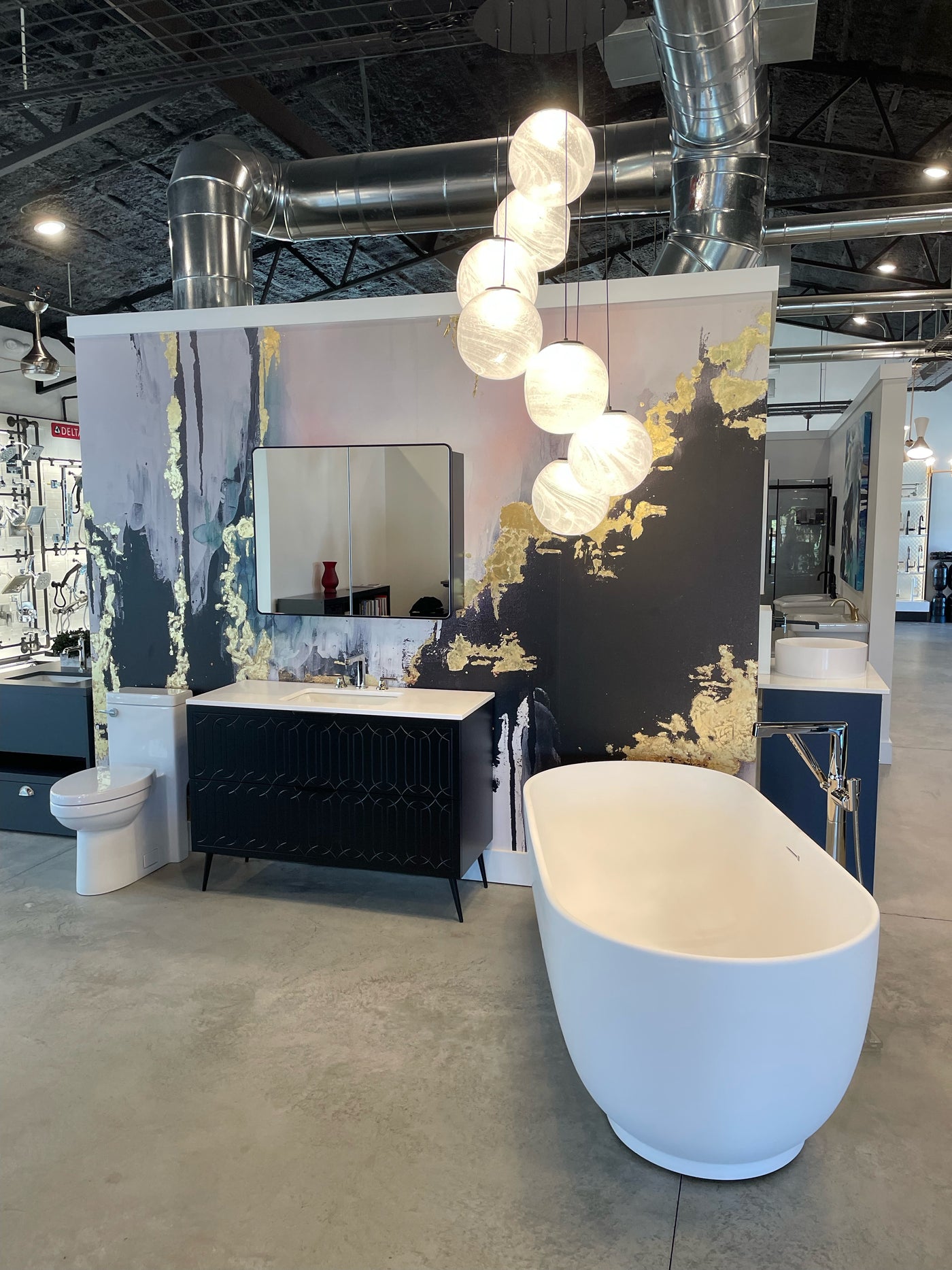 Modern interior design with a lamp, mirror, and decorative elements.