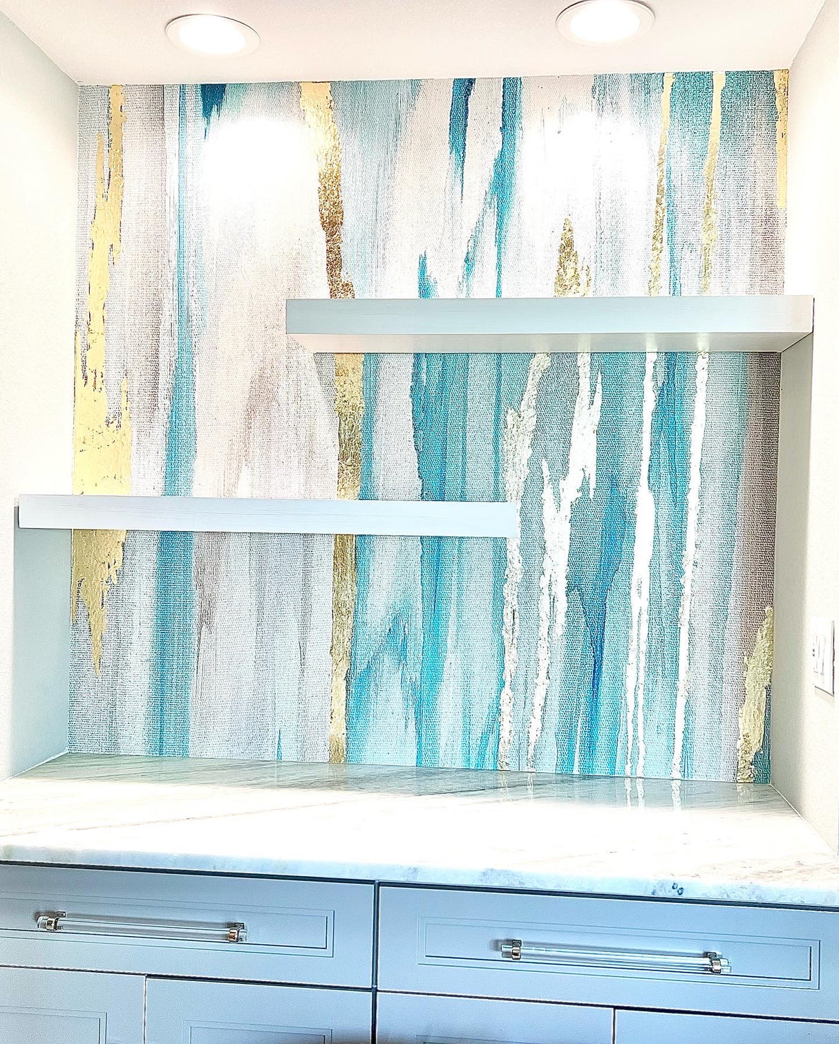 This bathroom utilized a Vivian Ferne wallpaper design with aquas and gold leafing. These abstract wallpaper murals are wonderful decor installations for bathrooms, spas, salons or bedrooms. These wallpaper designs are available in prepasted, peel and stick and french luxe materials.