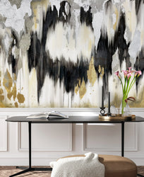 The large scale wallpaper design from famous interior designer, Vivian Ferne sets the mood of this living room decor. The ultra modern, maximalist design is edgy, stark and uses real gold and silver leafing to create a truly abstract interior wall art.