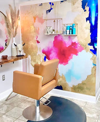 This salon used Vivian Ferne's abstract wallpaper design showcasing rich blue tones, fuchsias and gold leafing textures. This abstract wallpaper design makes this hair salon accent wall pop with intriguing shapes, textures and brushstrokes.