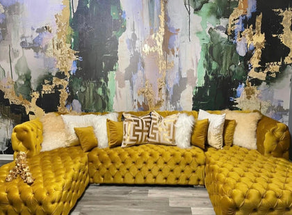 Green and gold living room with "Huntress" wallpaper accent wall
