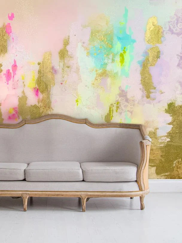 A close up section of the luxury living room decor featuring the abstract wallpaper design with teals, greens, lilacs and champagne blushes. Gold leafing creates a stunning multi-material abstract wall installation.