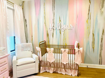 "Served Cold" nursery wallpaper with bows