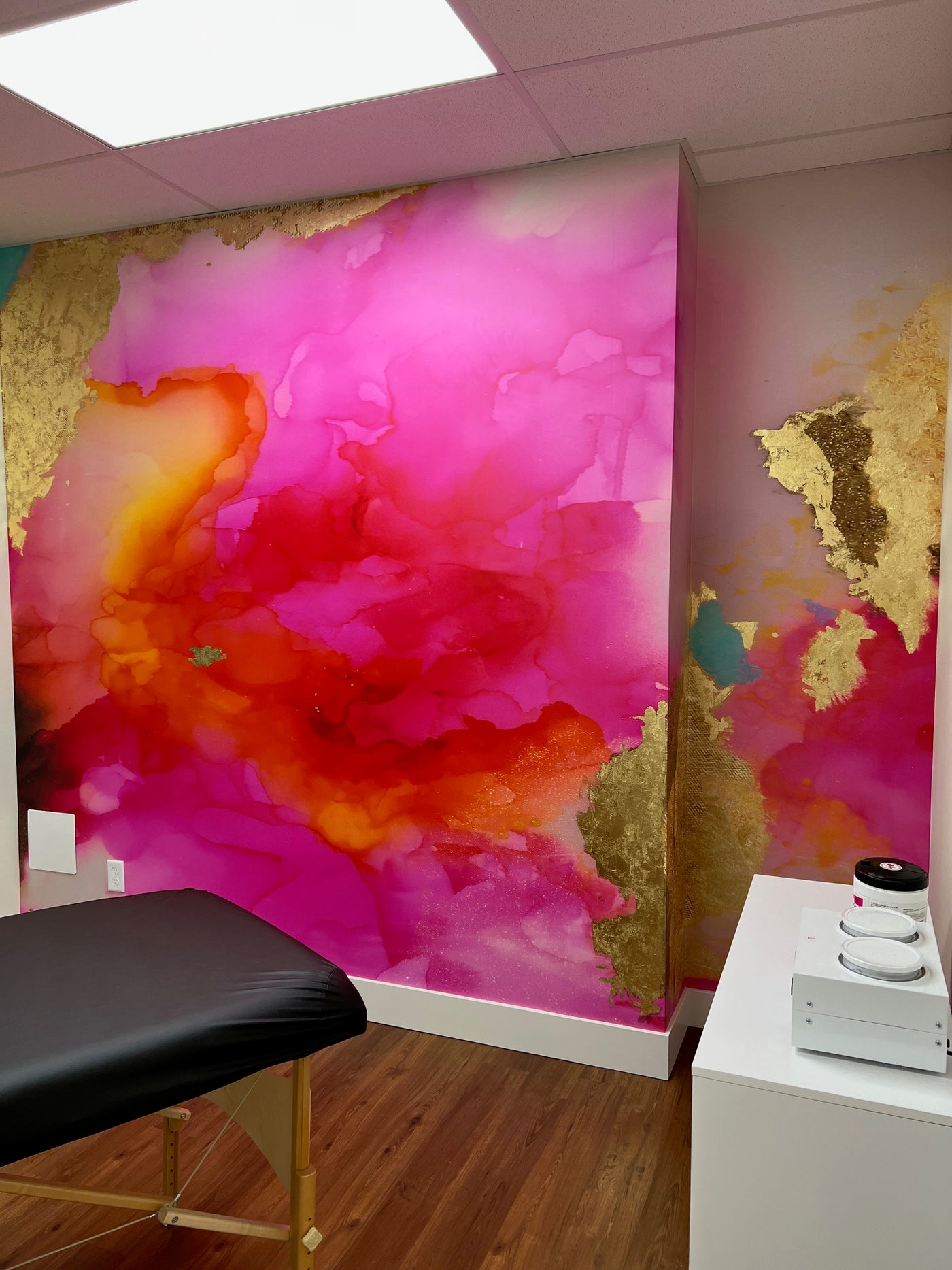 Colorful Sugar Coral Wall Paper on a wall with a massage chair and wax melter.