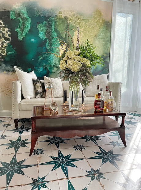 This amazing living room decor idea for abstract green wallpaper, white couch with white pillows, ornate wood coffee table, whisky products, floral arrangement, looking glasses and stunning tile flooring. This gold, green and beige abstract wallpaper design is a top pick for designers interested in bold, colorful selections. Great products for homes, hotels, airbnb, luxury vacation homes, spas, salons and any other luxury installation. The product is available in prepasted and peel and stick.