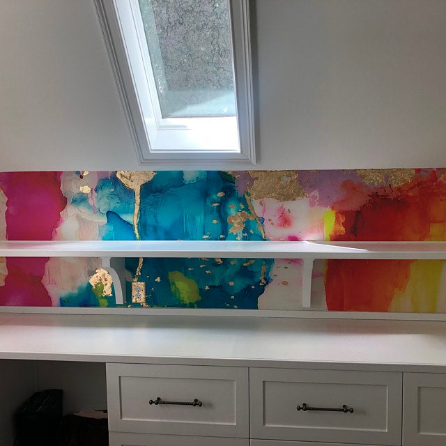 Clients brought their closet to life with this colorful, golf leafed peel and stick wall paper. The design is a digitized rendering of the original abstract artwork from famous abstract artist, Fran Maass Katz. This design is available in pre pasted, peel and stick and French Luxe materials. 