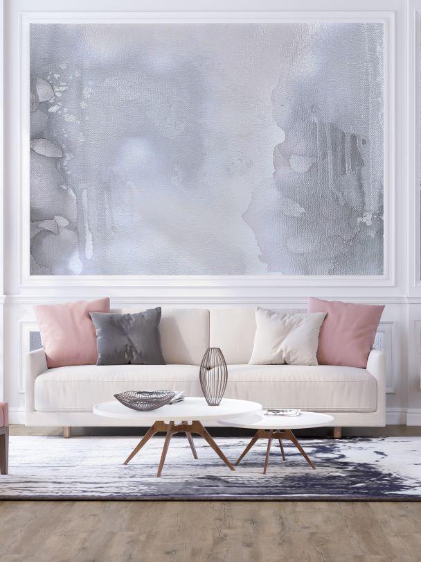 Luxury living room interior design concept featuring beige couch, pastel pillows, white coffee table, decorative vase and bowl. The interior wall design features a large scale abstract wallpaper design from famous wallpaper designer, Vivian Ferne. This monochromatic design is the best interior wallpaper for installed in beautiful vacation homes, offices, airbnbs, hotels, boutique hotels and more. 