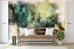 Best Interior Designer Near Me - Entry way decor with Bold Abstract Green and Gold wallpaper, rustic wooden bench white pillows, woven cloth rug, white trim and baseboard and potted plants. This is top interior design pick for modern bold design concepts that are refined and maximalist. The green wallpaper is a best home interior decoration this year. Great ideas for living room and interior wall design. 