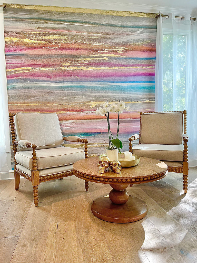 This modern sunset themed wallpaper is a stunning feature for any living room or dining room decor concept. This look goes great with beige furniture, wooden coffee tables and orchids. The gold accent decor compliments the golden hues and textures in the wallpaper mural. 