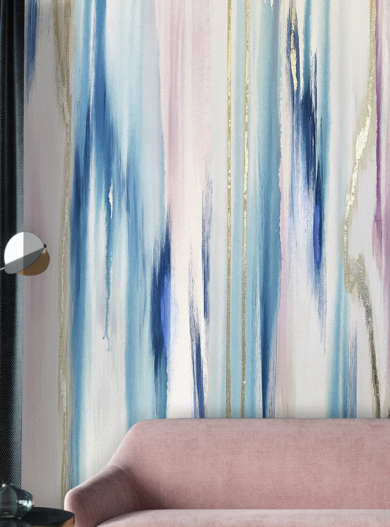 This wallpaper design, "Opal Falls" is a calming and luxurious collection of golds, blues and opals golds and grays. This image is a zoom in shot of the wallpaper in a luxury living room scene.