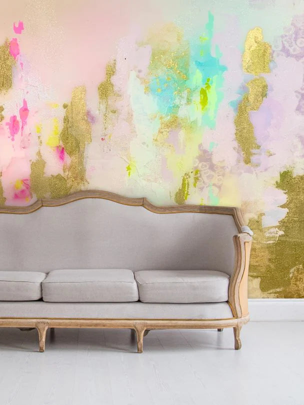 A close up section of the luxury living room decor featuring the abstract wallpaper design with teals, greens, lilacs and champagne blushes. Gold leafing creates a stunning multi-material abstract wall installation.