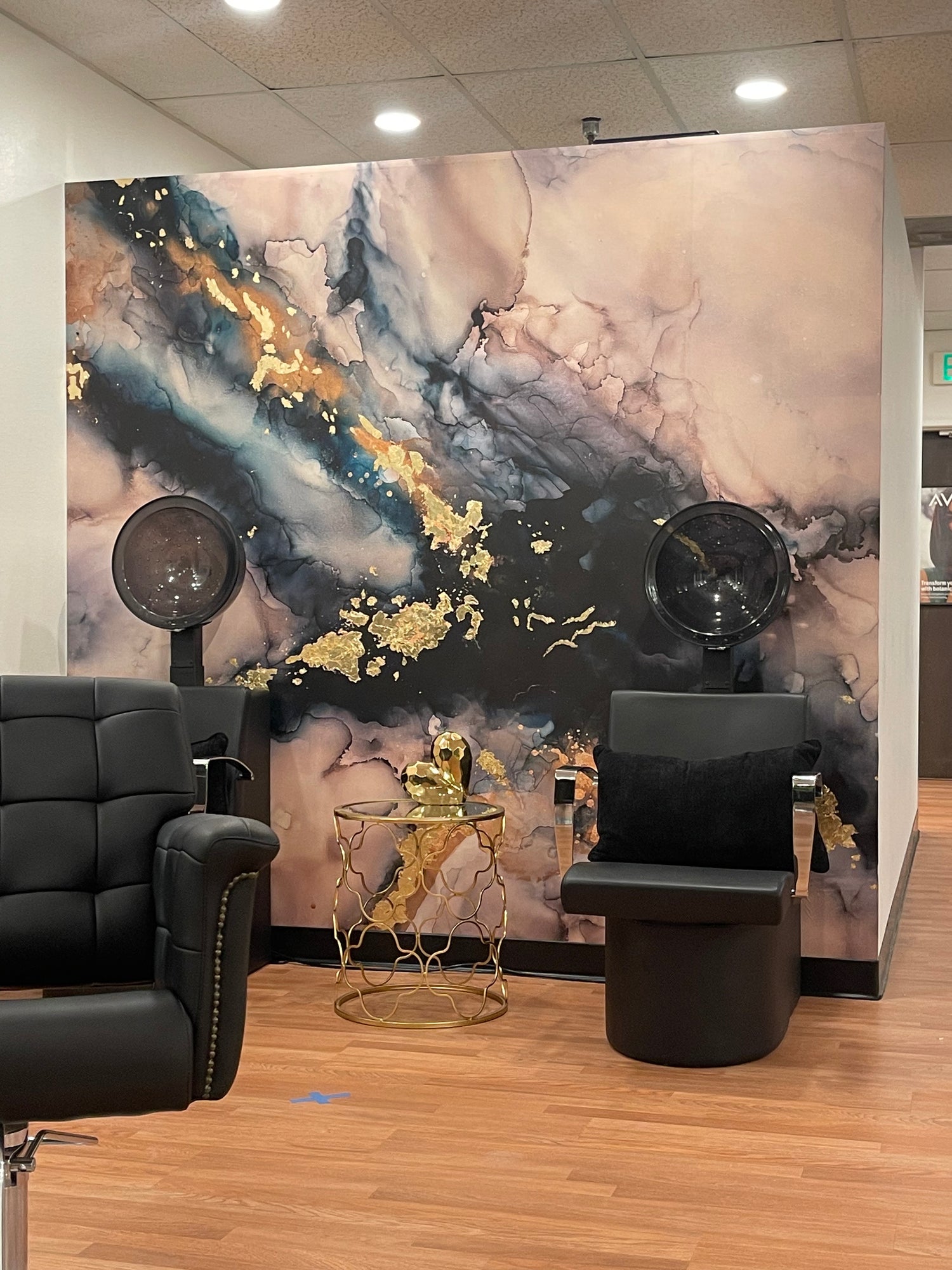 This salon chose the ocean themed "Marine Layer" Wallpaper to create a stunning accent wall. Vivian Ferne offers custom sizing to meet almost any interior design project needs.