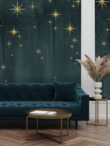 Teal and Gold Metallic Wallpaper Behind Green Velvet Sofa